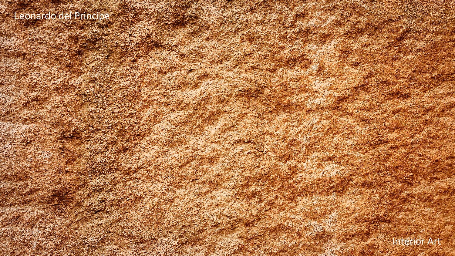 ABGR02 Close-up of a textured orange-brown stone surface with a rough, uneven texture, conveying a natural and earthy feel. Abstract composition